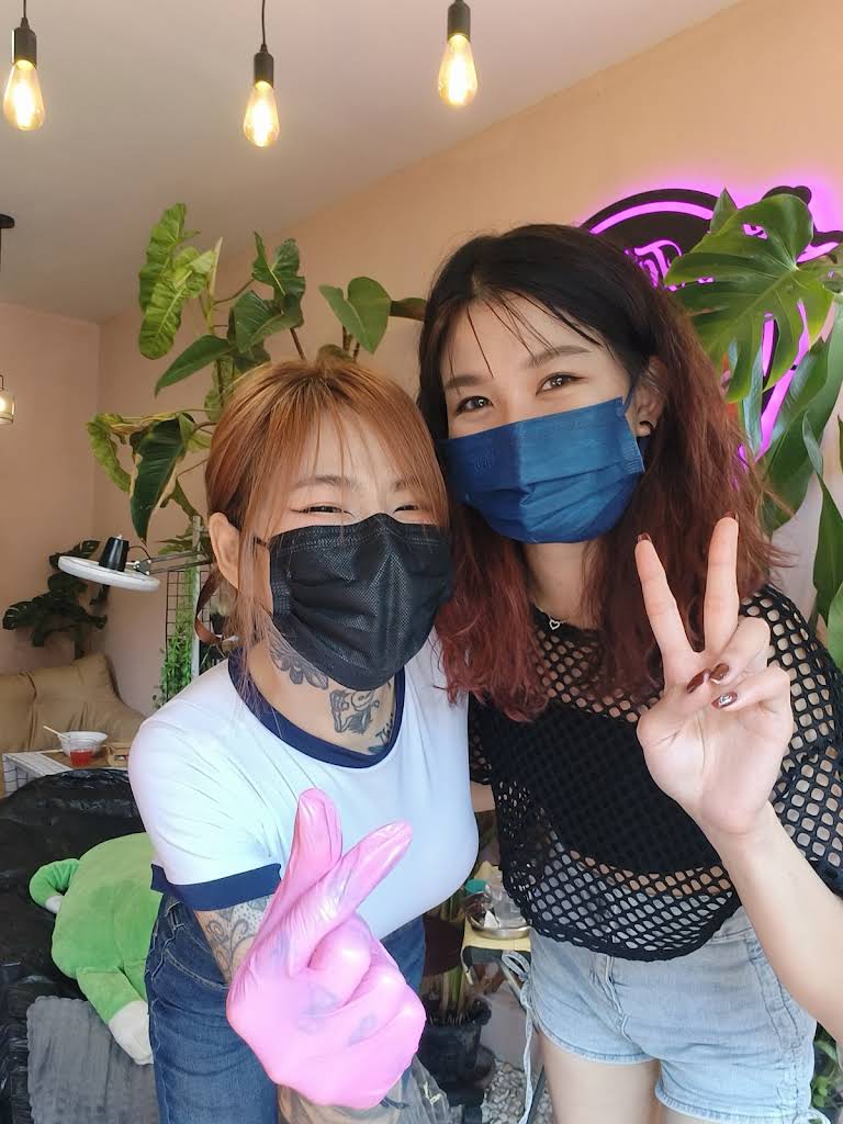 Little Tree Tattoo Studio artists in welcoming studio environment